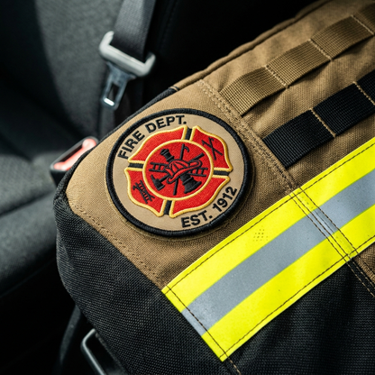 Firefighter seat cover crest and reflective stripe detail